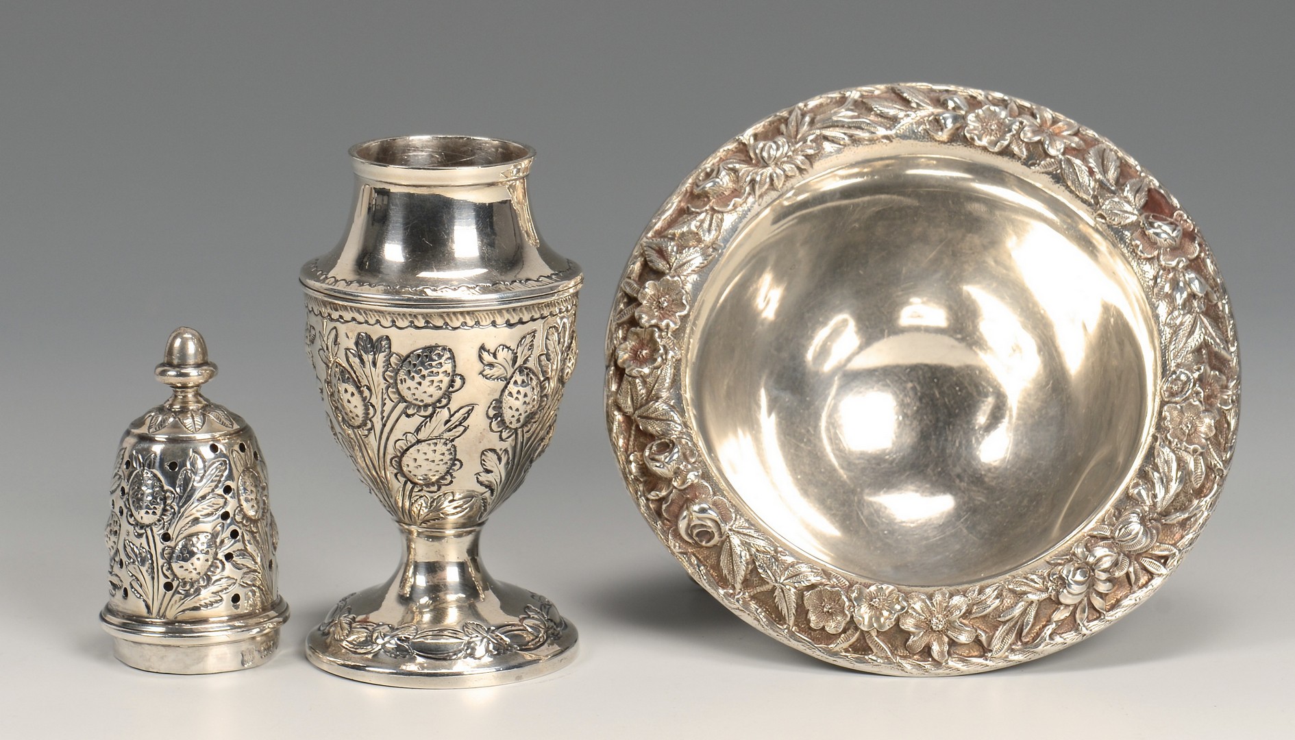 Lot 677: Silver Napoleon spoon, caster and candy dish