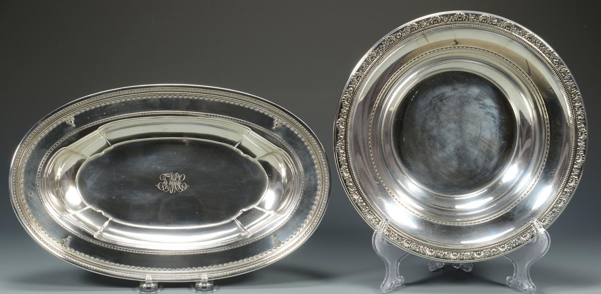 Lot 679: 4 Sterling Silver Serving Items
