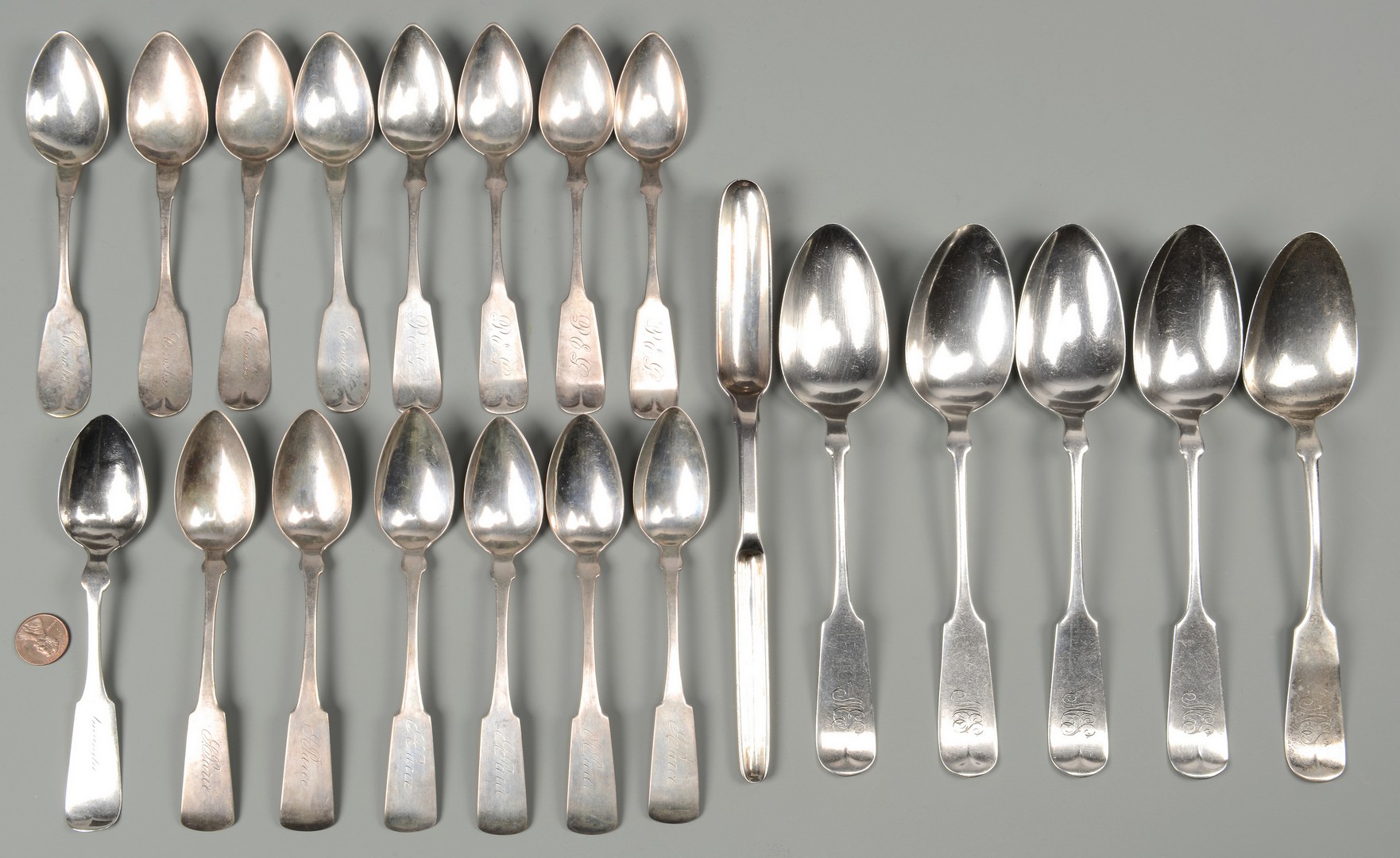 Lot 682: 21 Silver Table and Serving Spoons.