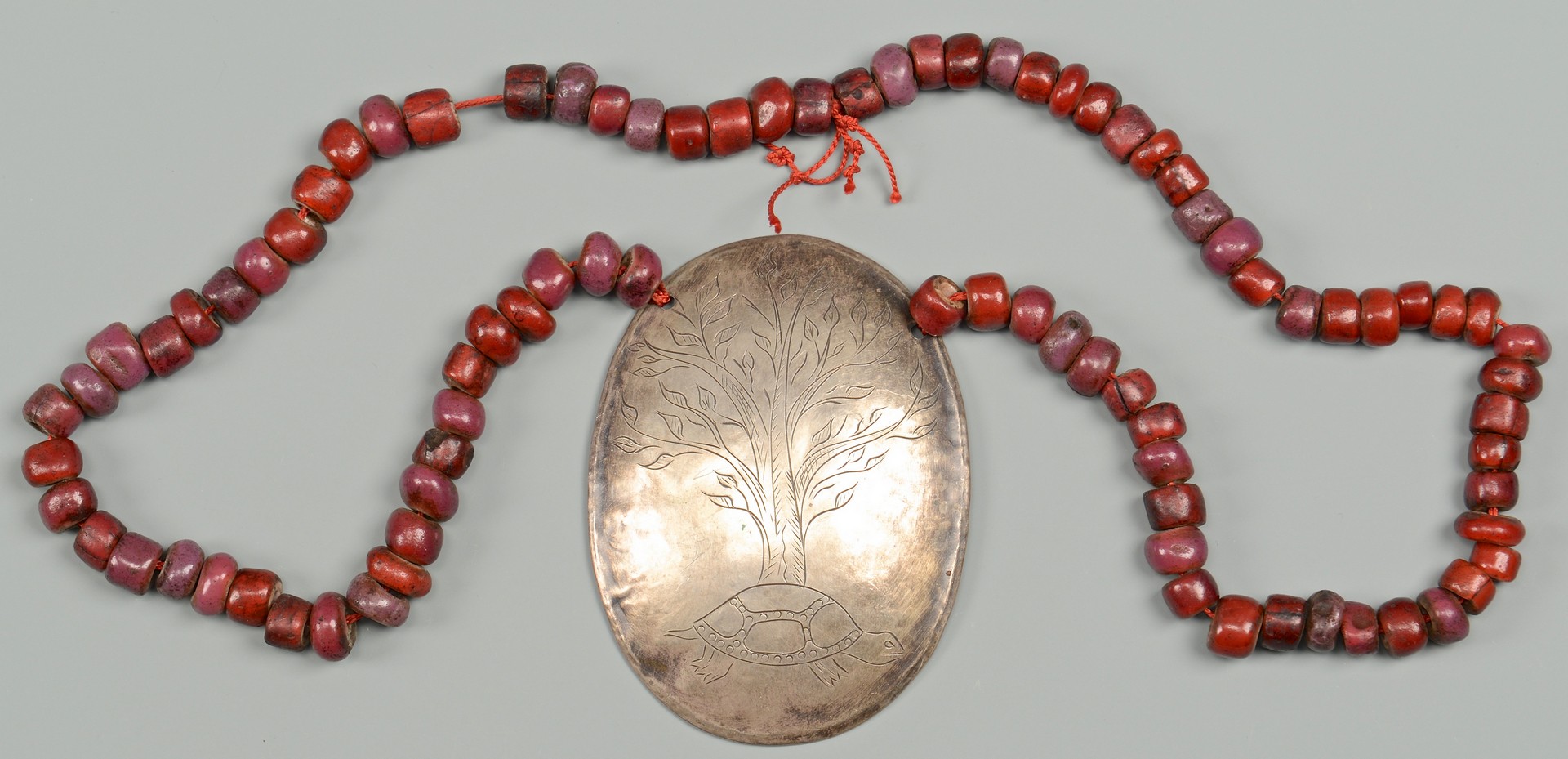 Lot 780: Trade Beads and Silver Gorget