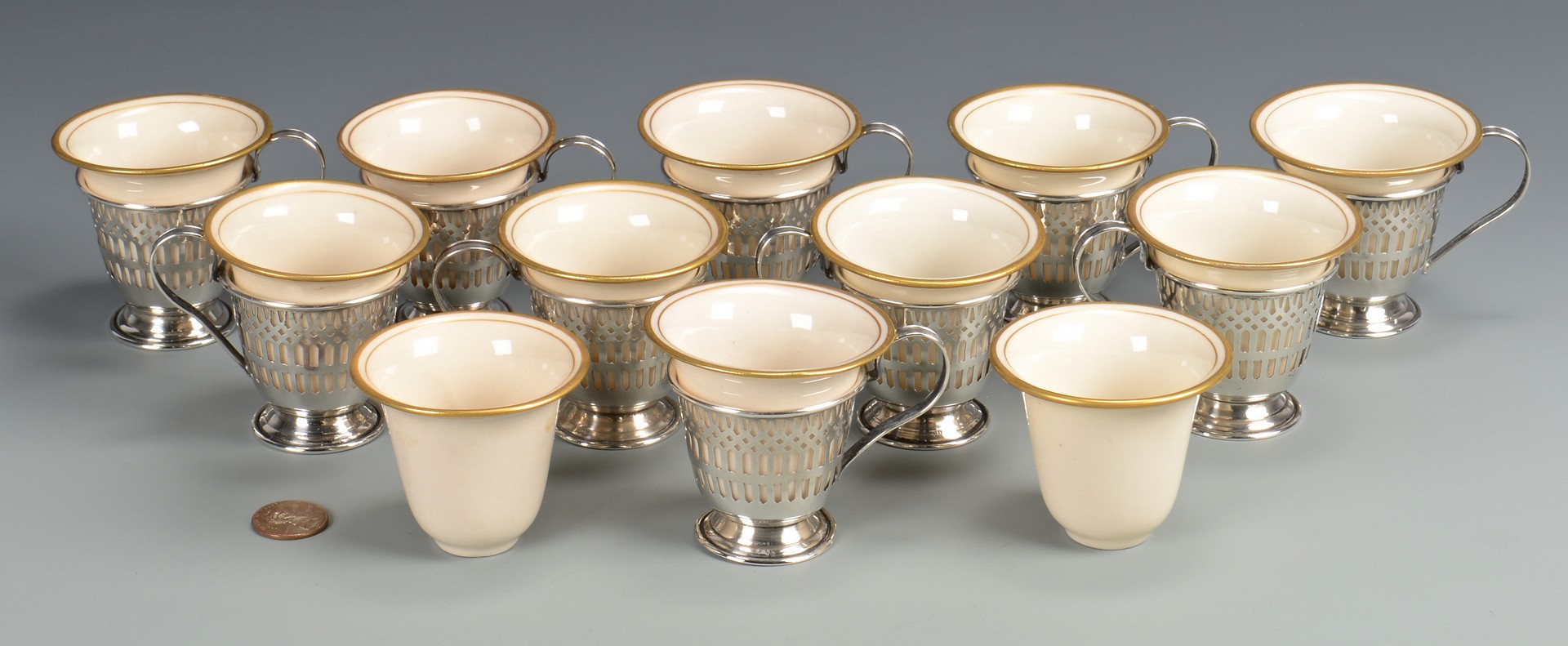 Lot 813: 10 Porcelain and Sterling demitasse cups