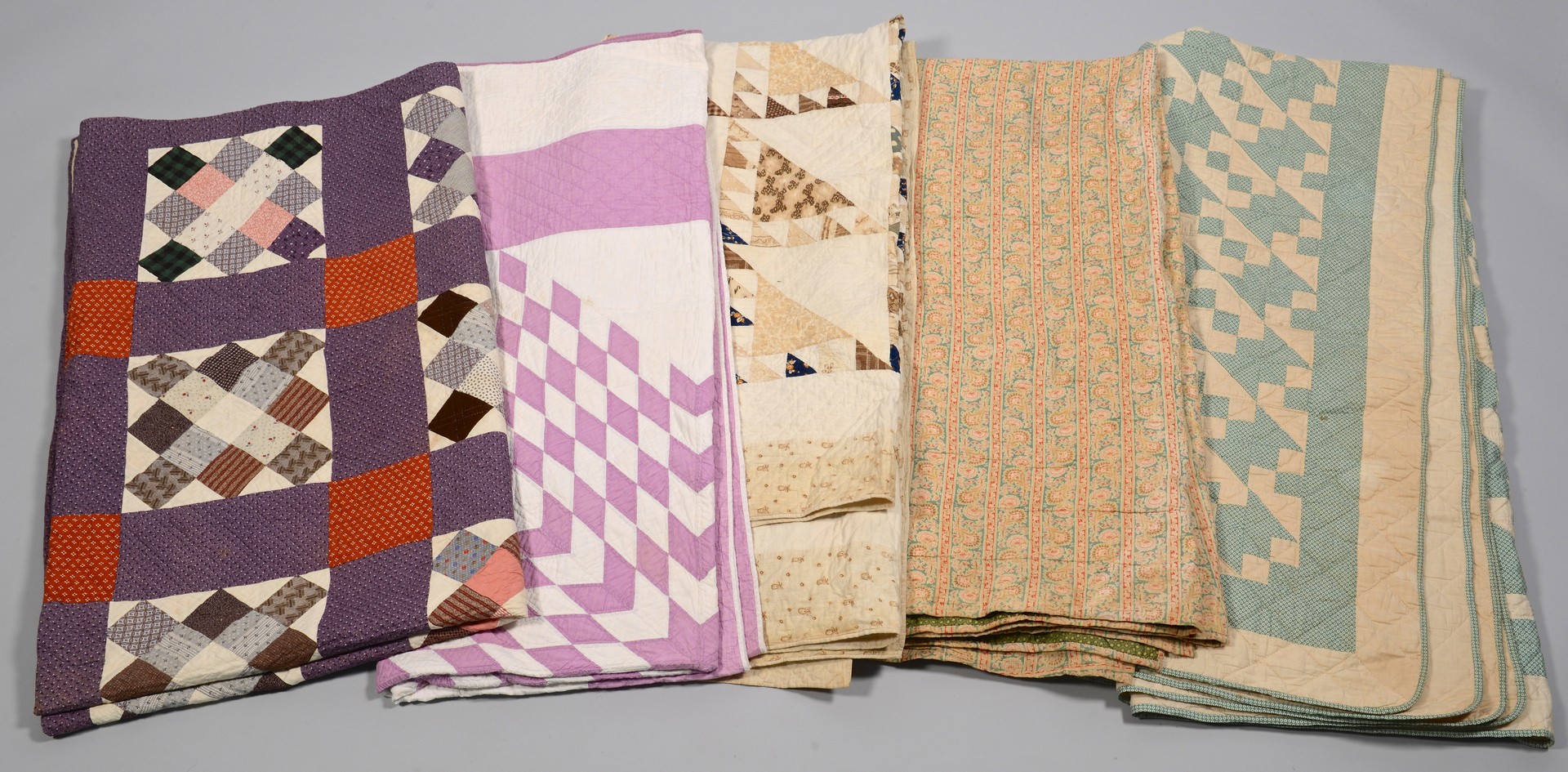 Lot 849: Group of 5 quilts, 1 signed