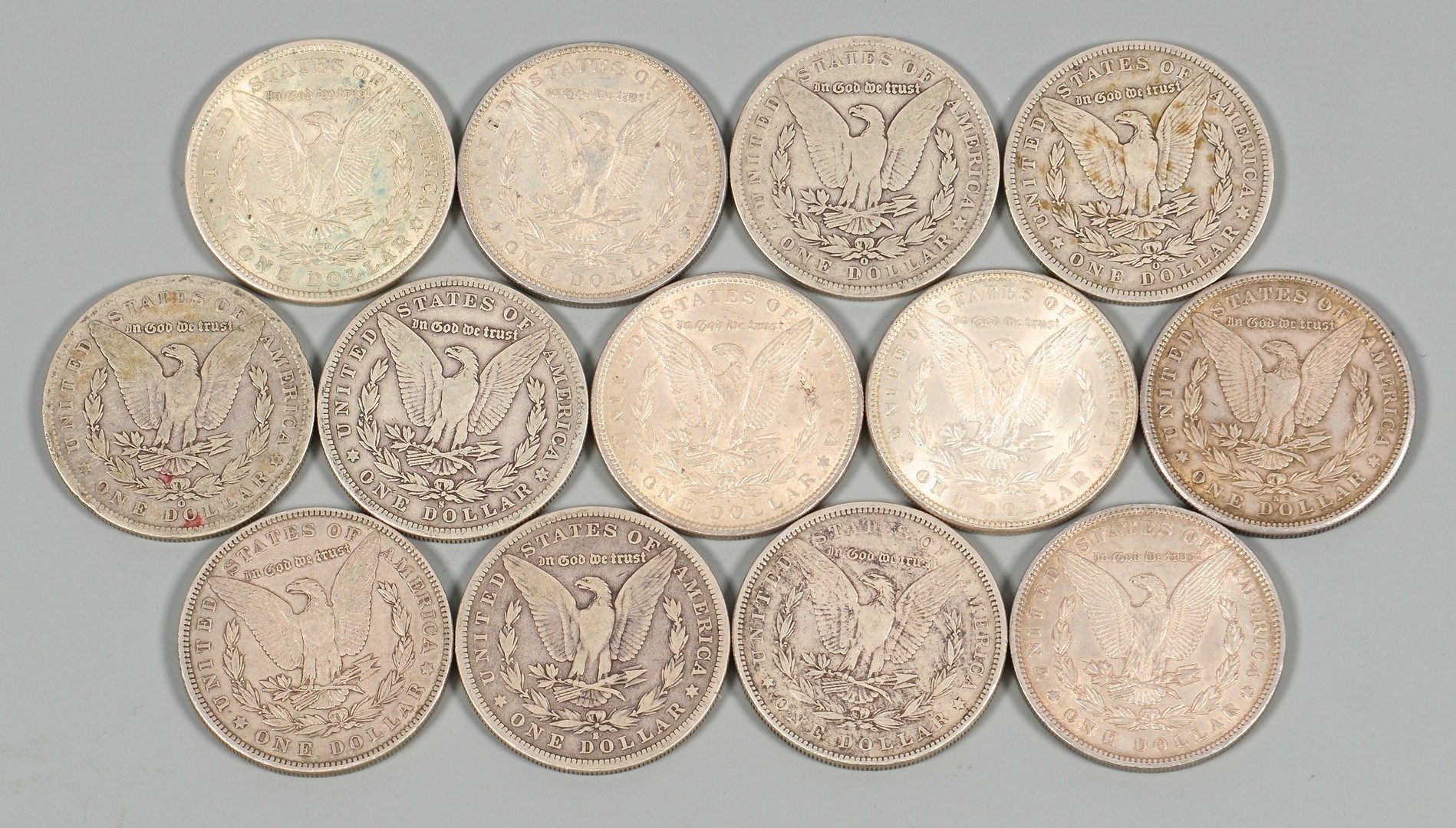 Lot 872: 13 US Morgan Silver Dollars