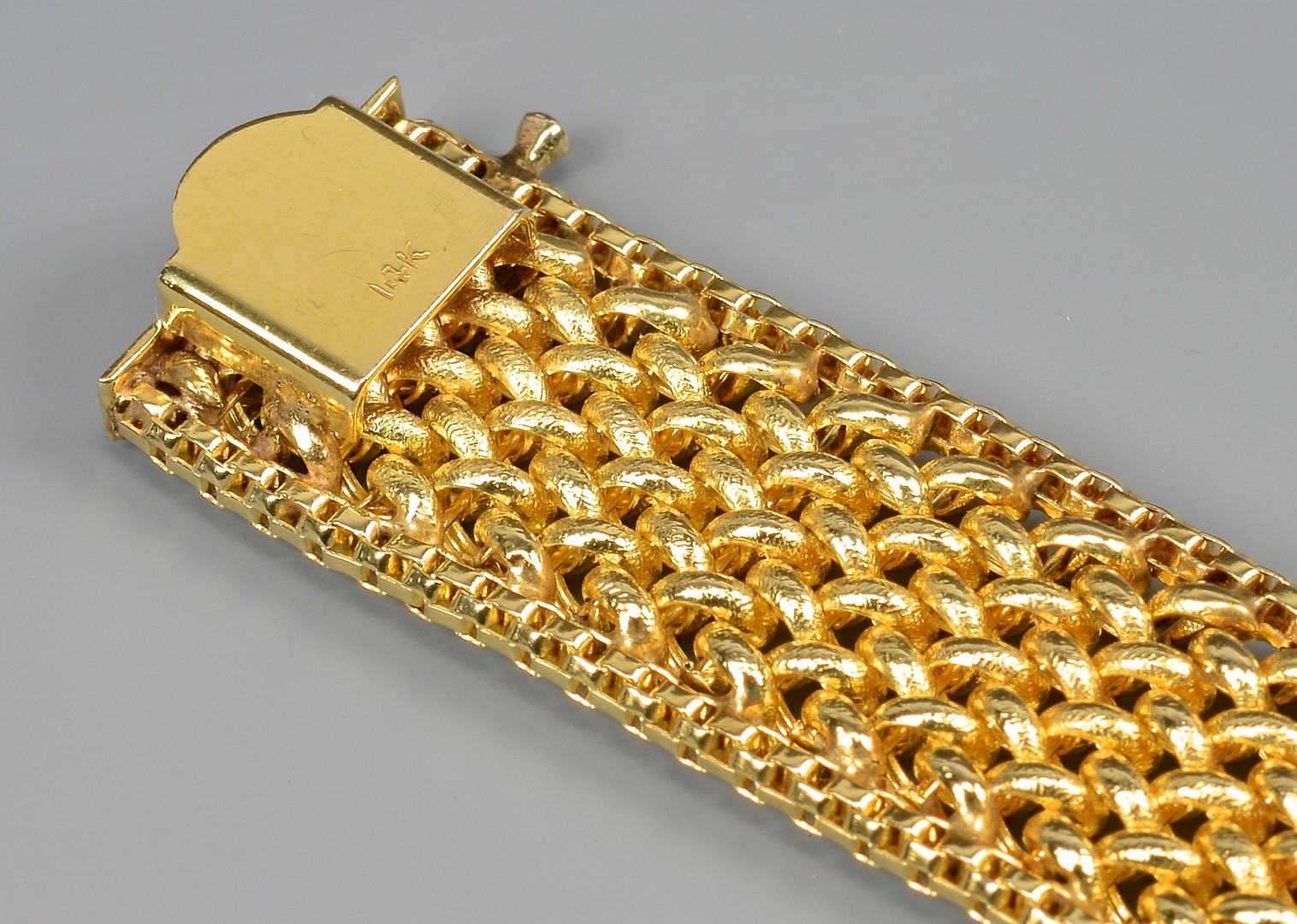 Lot 98: Woman's 14K Gold Woven Bracelet