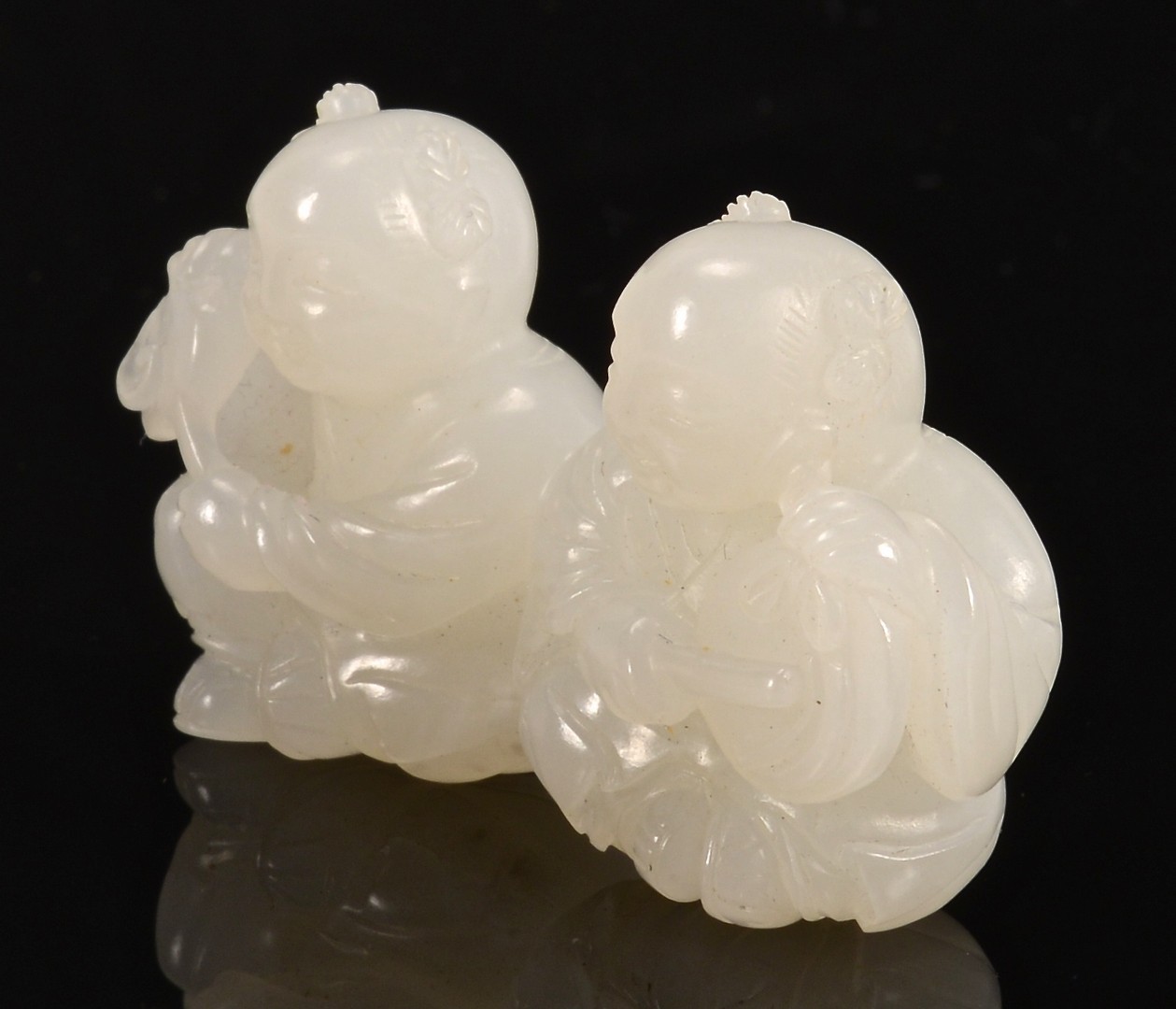 Lot 1: Chinese White Jade Figural Group, 2 boys
