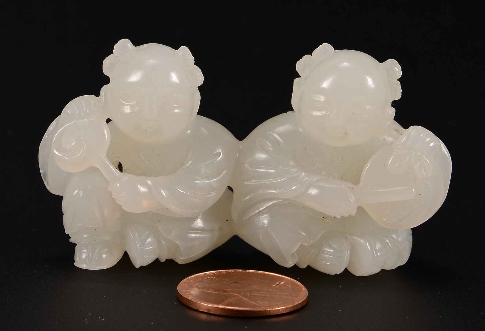 Lot 1: Chinese White Jade Figural Group, 2 boys