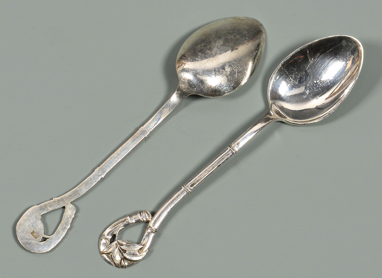 Lot 31: Asian silver smalls inc. Torii gate, spoons
