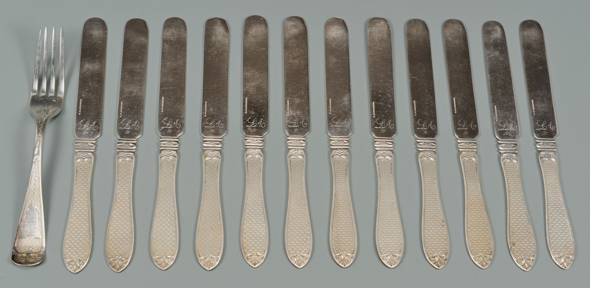 Lot 322: 12 coin silver knives plus 1 fork