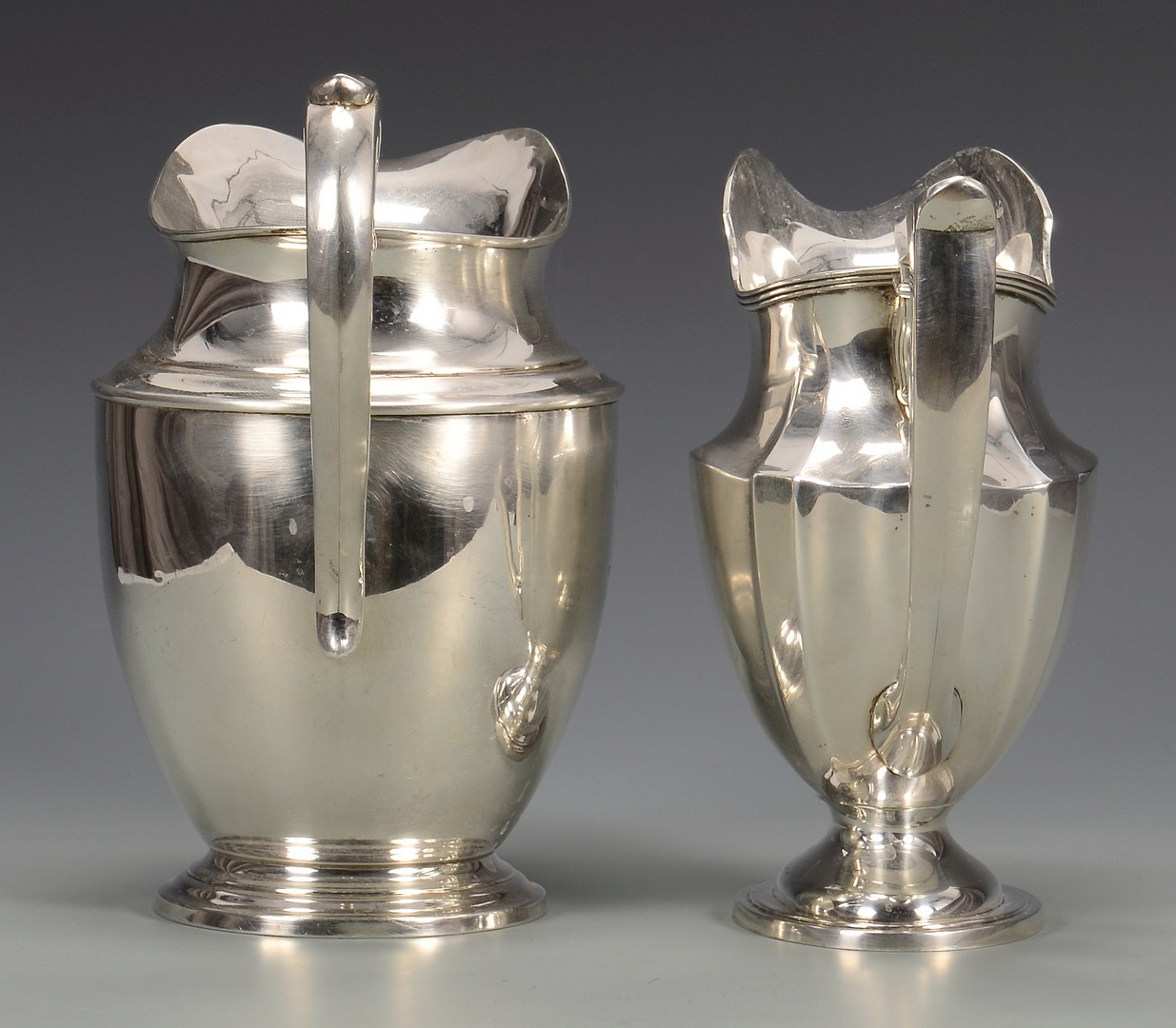 Lot 339: 2 Sterling Silver Water Pitchers
