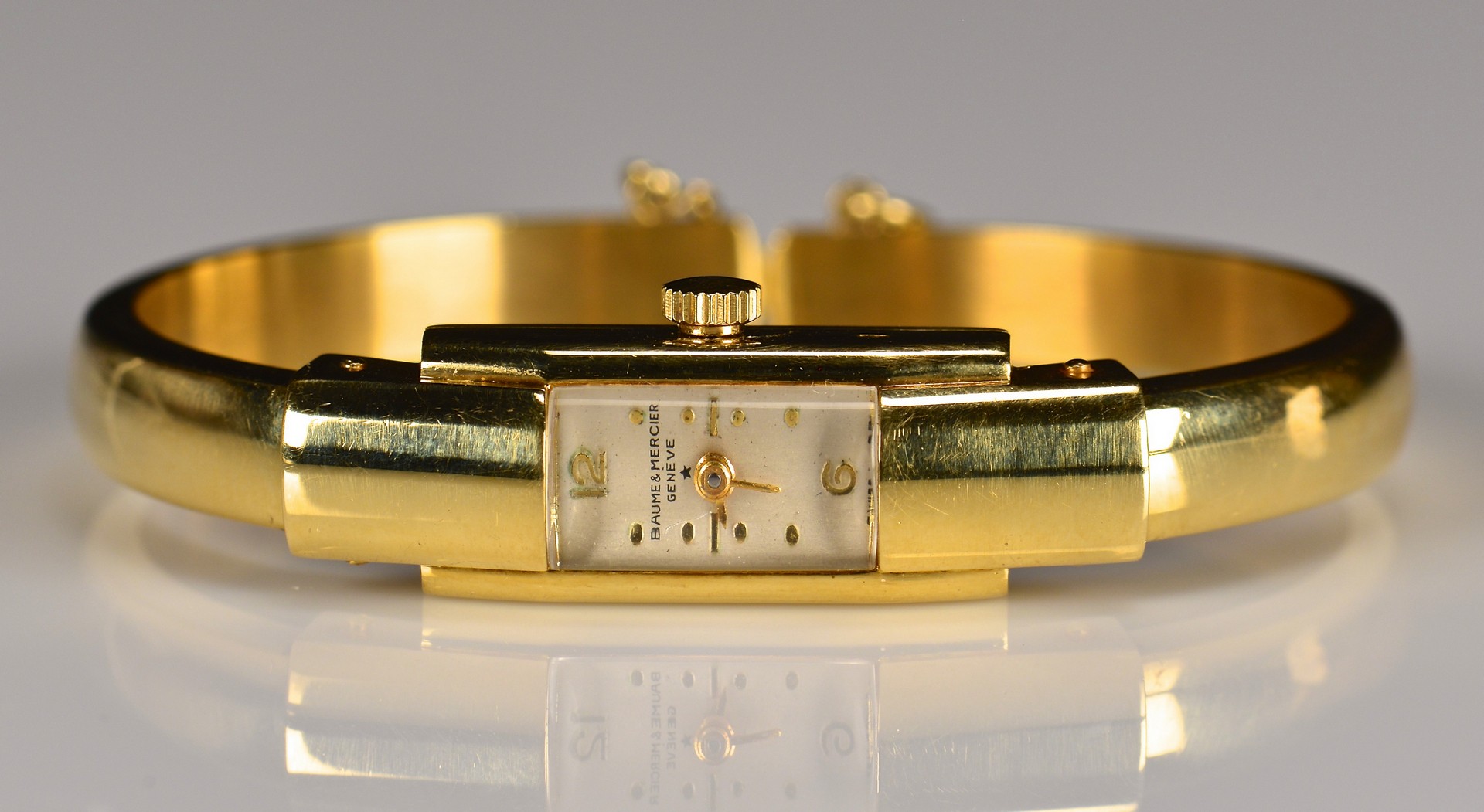 Lot 356: 18K Baum Mercier Cuff Bracelet Watch