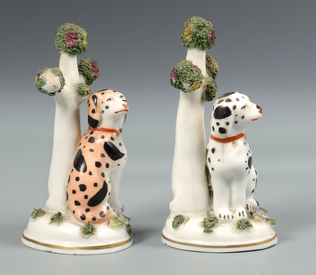 Lot 484: 3 Miniature Staffordshire Figures inc bocage dogs