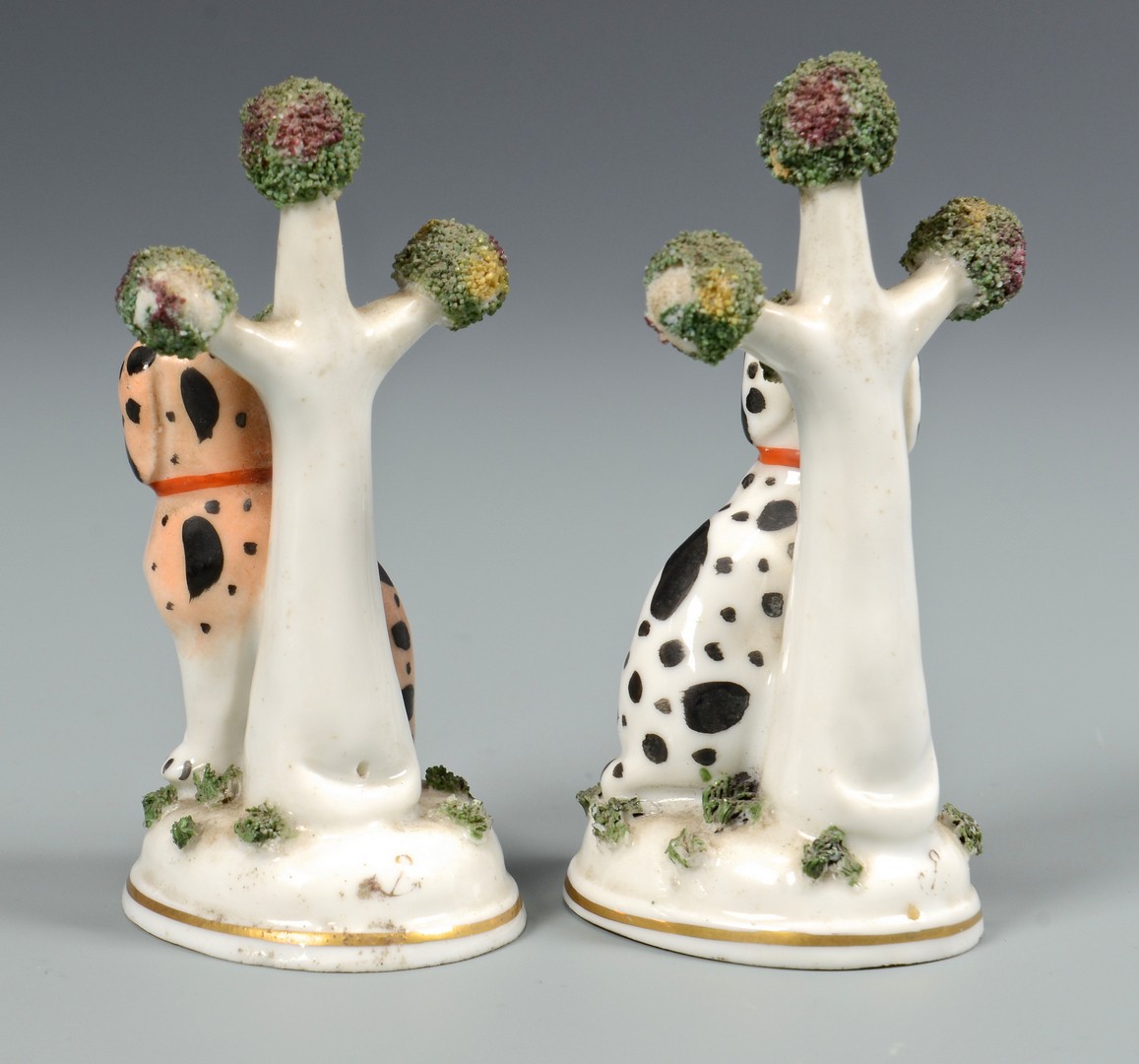 Lot 484: 3 Miniature Staffordshire Figures inc bocage dogs