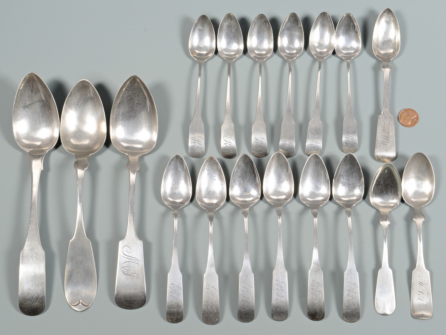 Lot 567: Grouping of 18 Coin Silver Spoons