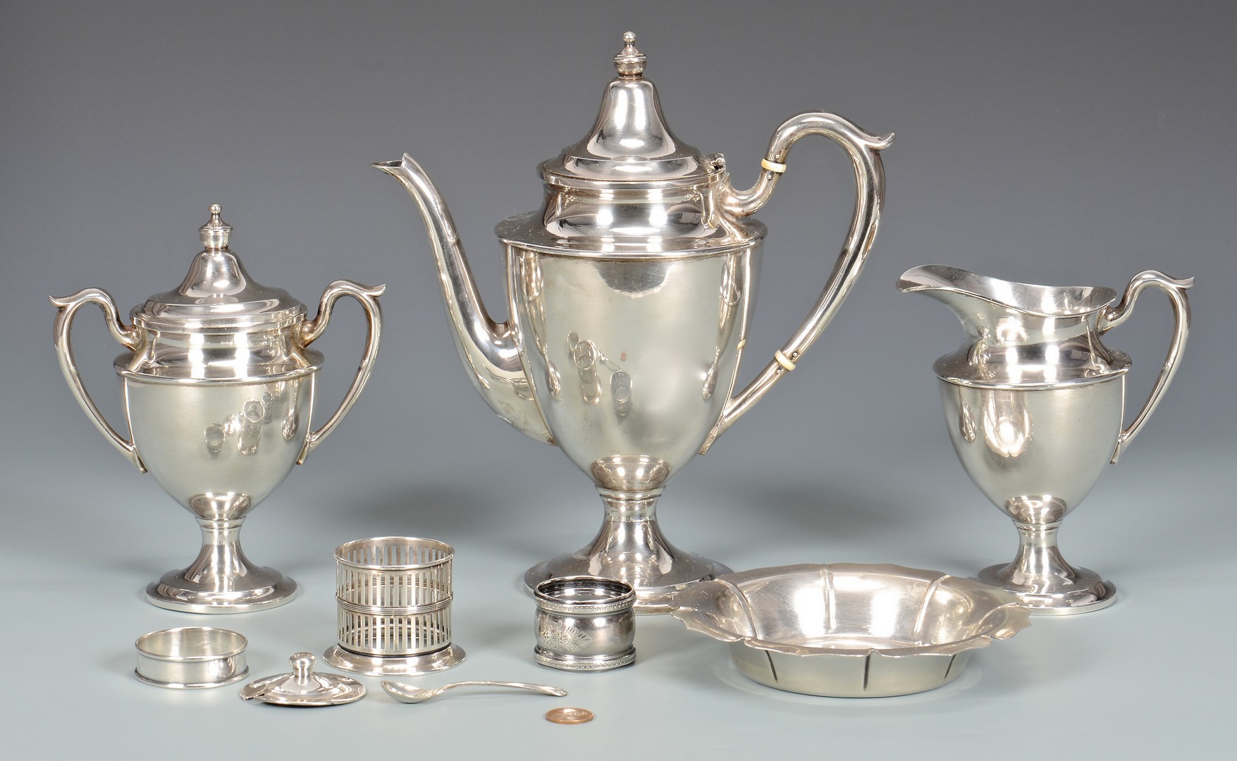 Lot 576: 3 Sterling Silver Tea Items & More