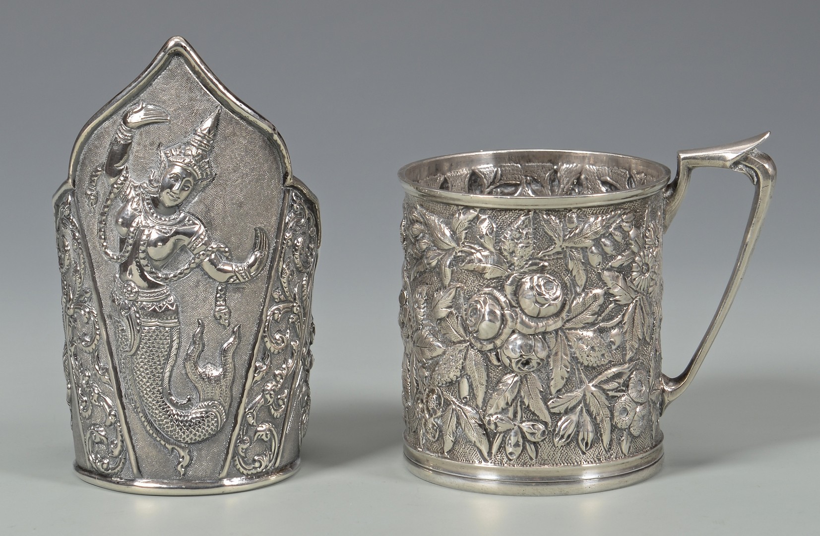 Lot 580: Sterling Repousse Cup, Asian Cuff, Spoons
