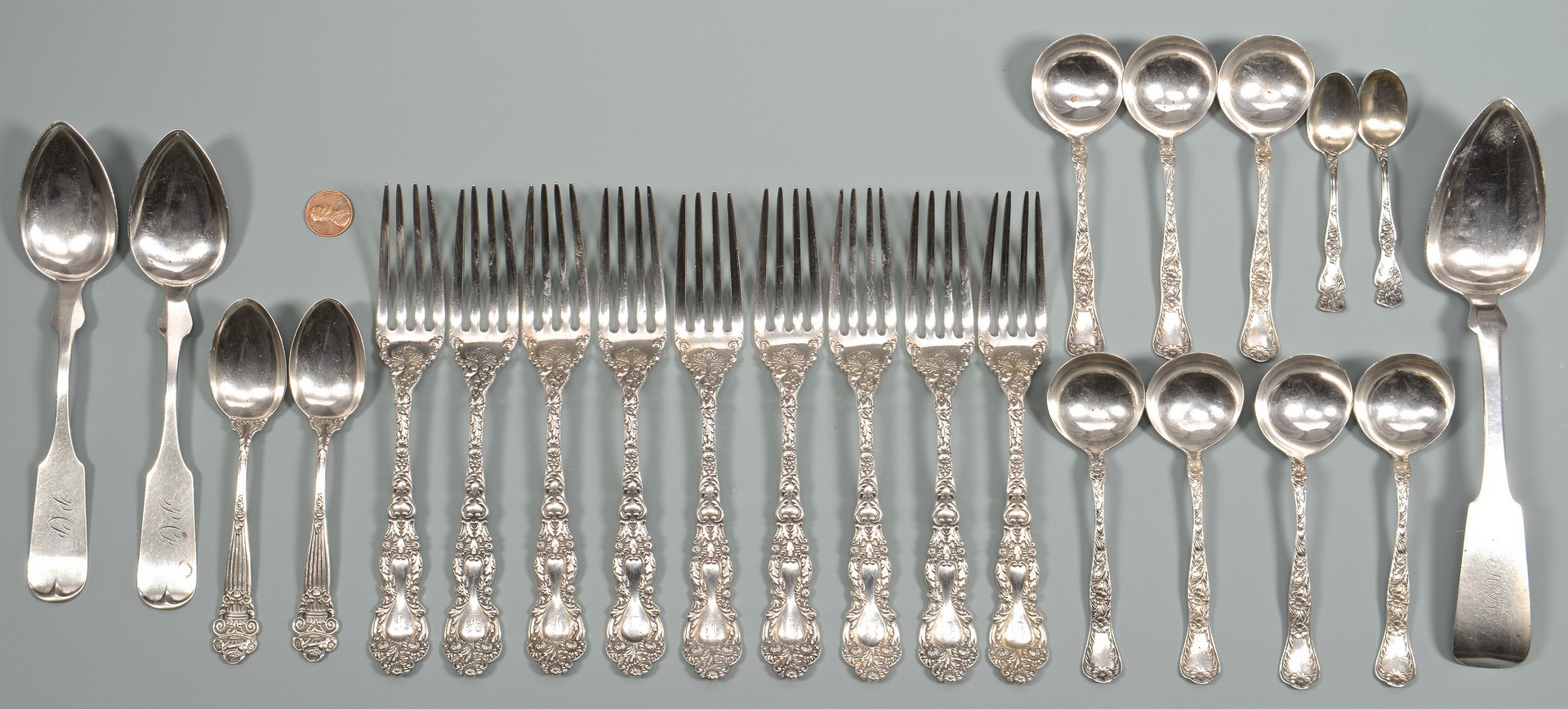 Lot 581: 23 pcs sterling and coin flatware inc. Memphis