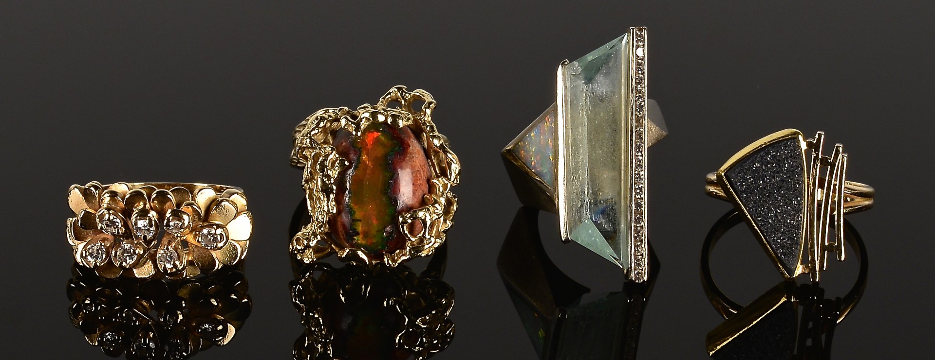 Lot 587: 4 Gold and Stone Fashion Rings