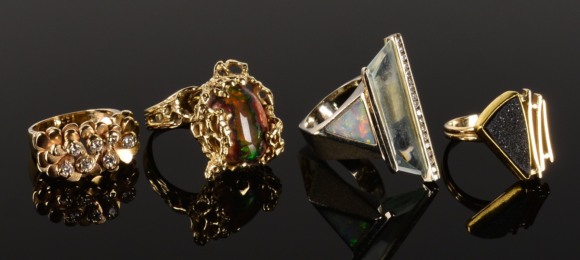Lot 587: 4 Gold and Stone Fashion Rings