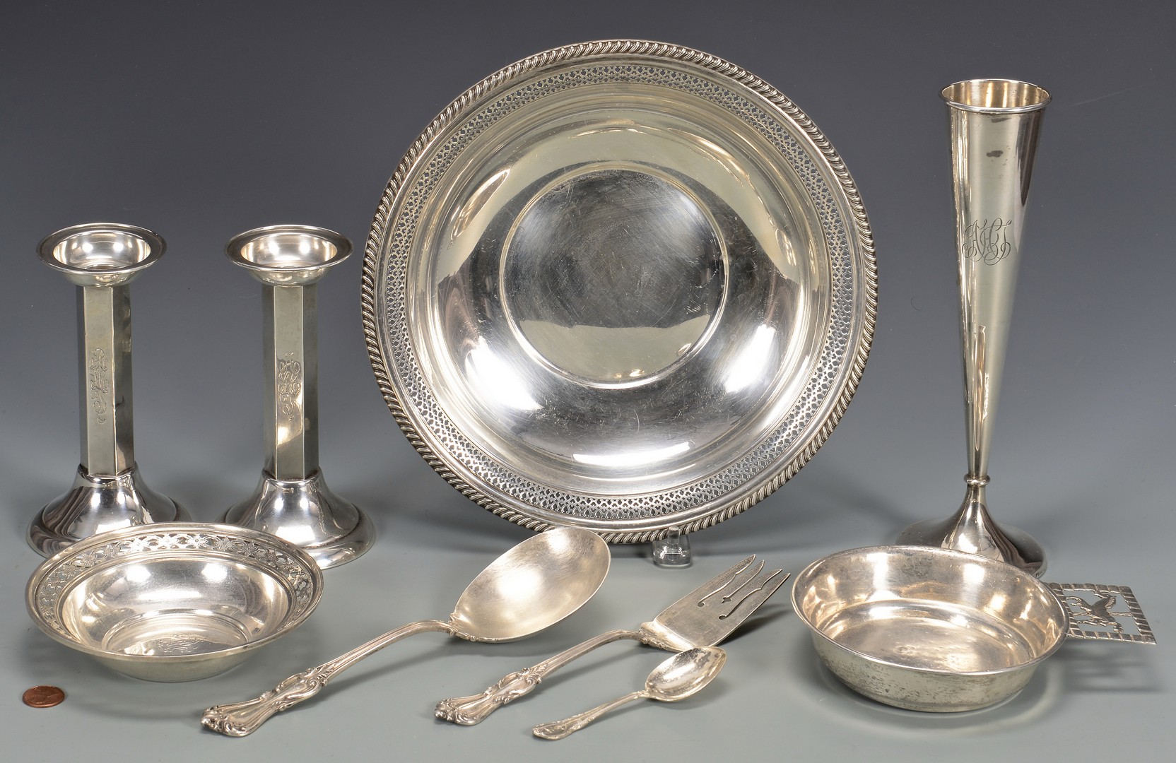 Lot 826: 9 Sterling Silver Table Items incl. candlesticks