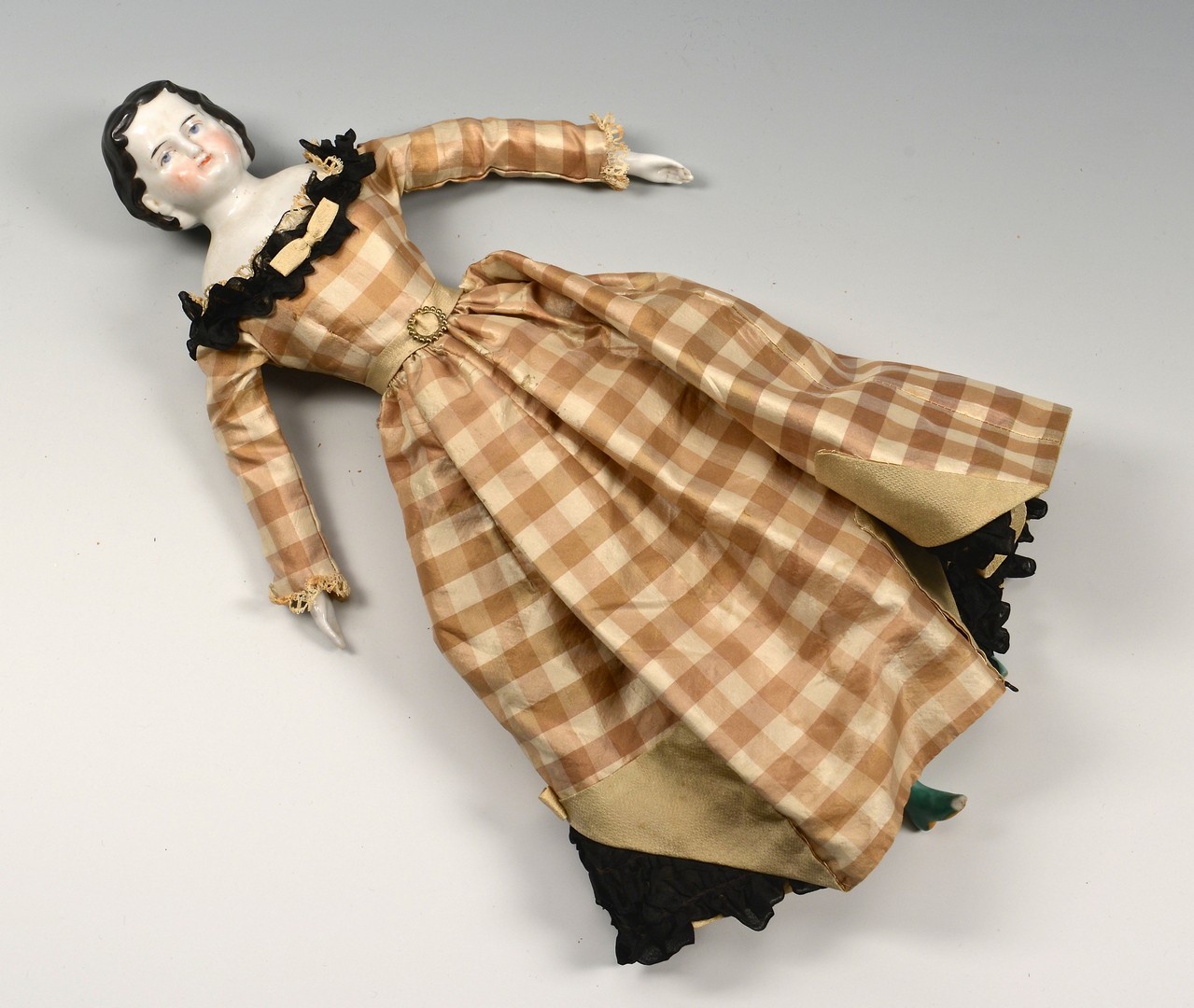 Lot 851: 19th Century Dolls: 1 porcelain, 2 wood