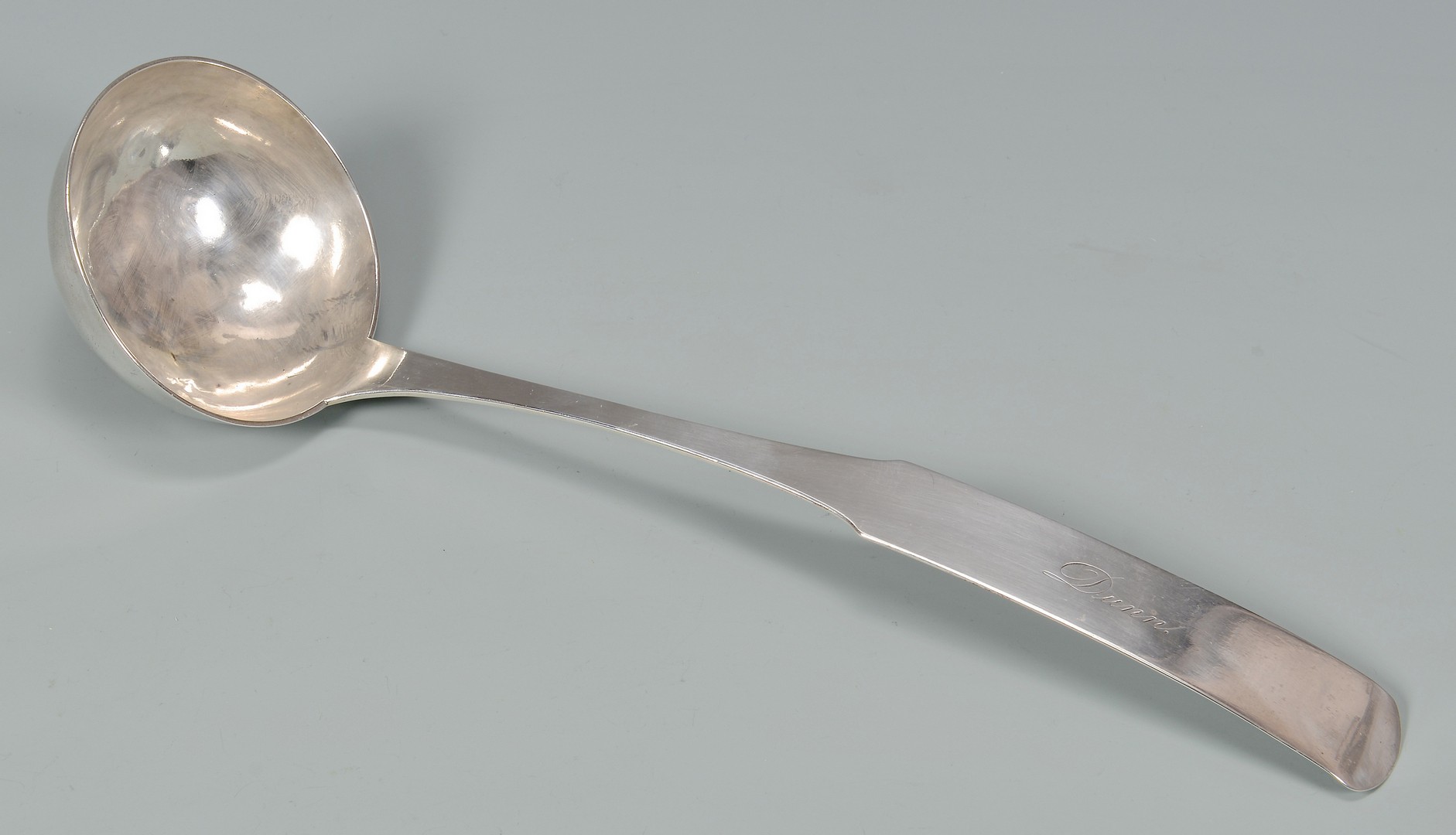 Lot 145: Ringo TN Coin Silver Punch Ladle
