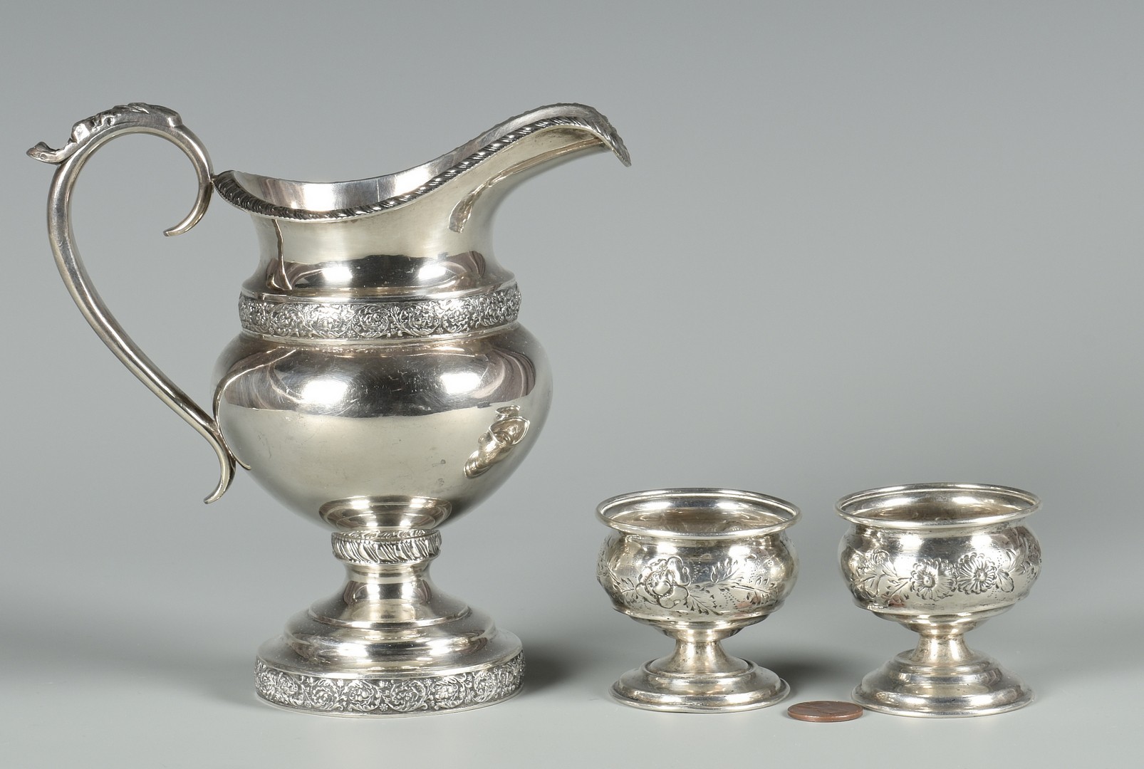 Lot 157: Pair coin silver salts and Kitts KY Cream Jug