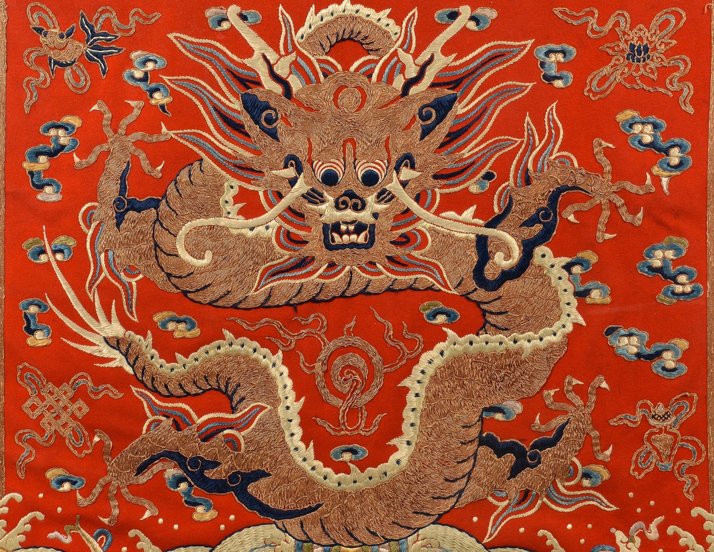 Lot 33: Dragon Embroidered Kesi, Red Ground