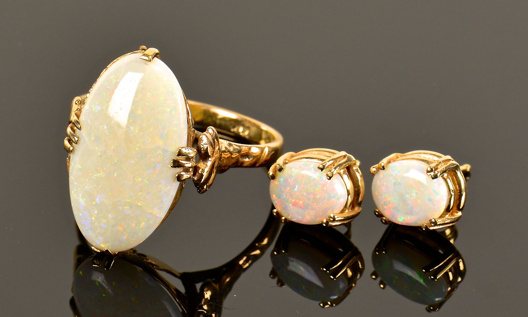 Lot 377: Platinum Emerald Diamond Ring plus opal set