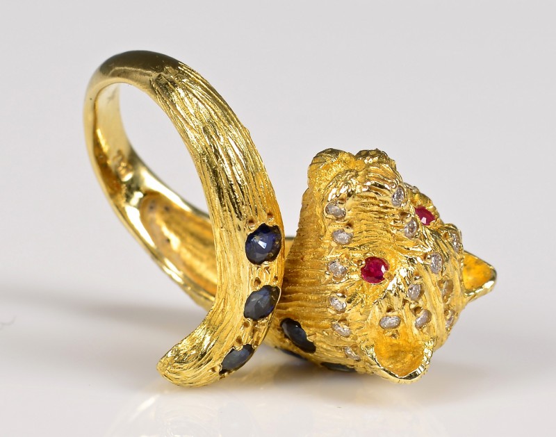 Lot 378: 18K Leopard Ring with Stones
