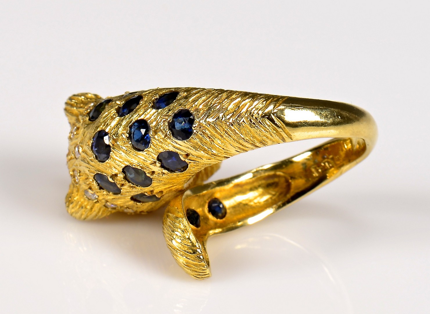 Lot 378: 18K Leopard Ring with Stones