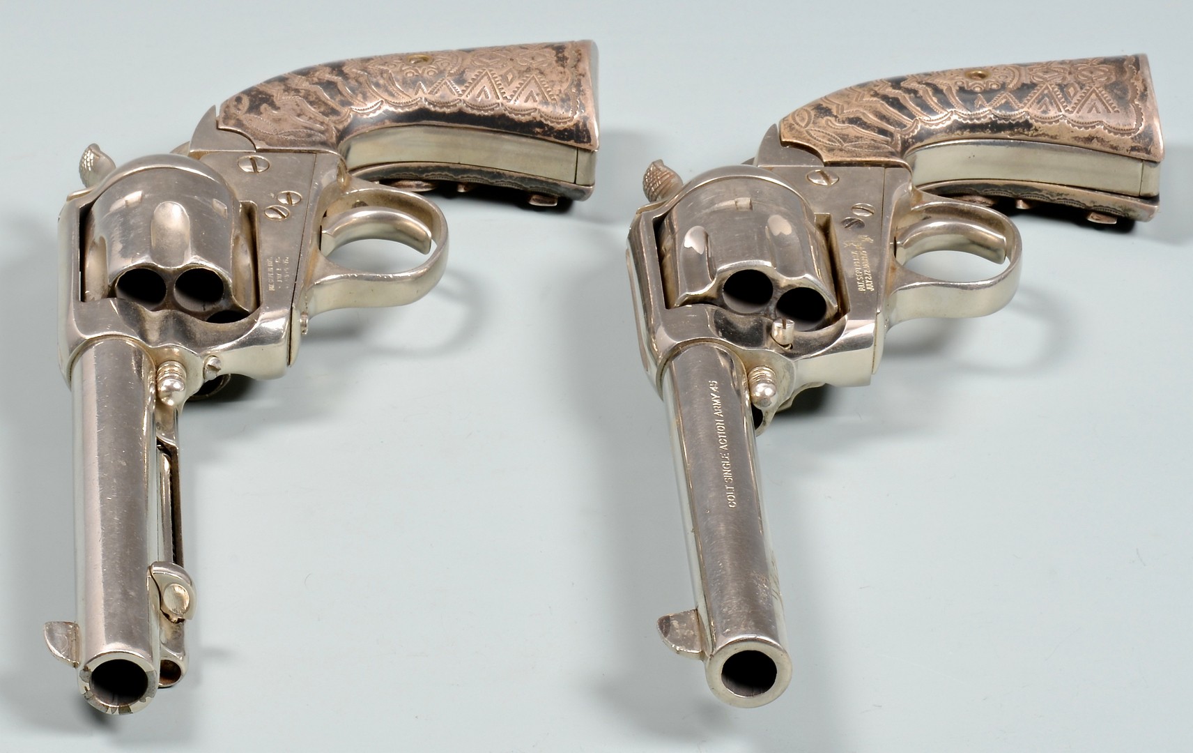 Lot 541: 2 Colt Pistols, .45 Caliber w/ Turquoise Inlays wi