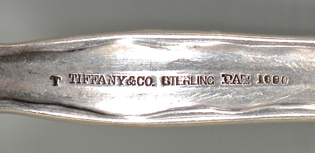 Lot 55: Tiffany Lap Over Edge Silver Forks, 9