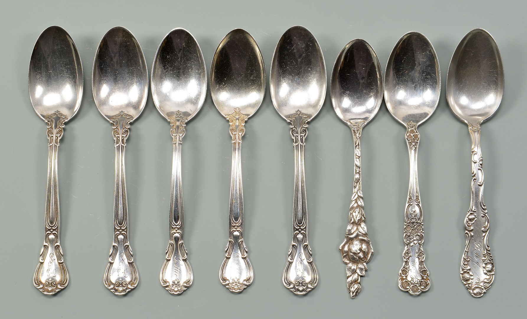 Lot 56: Tiffany Lap Edge Serving Spoon plus other sterling