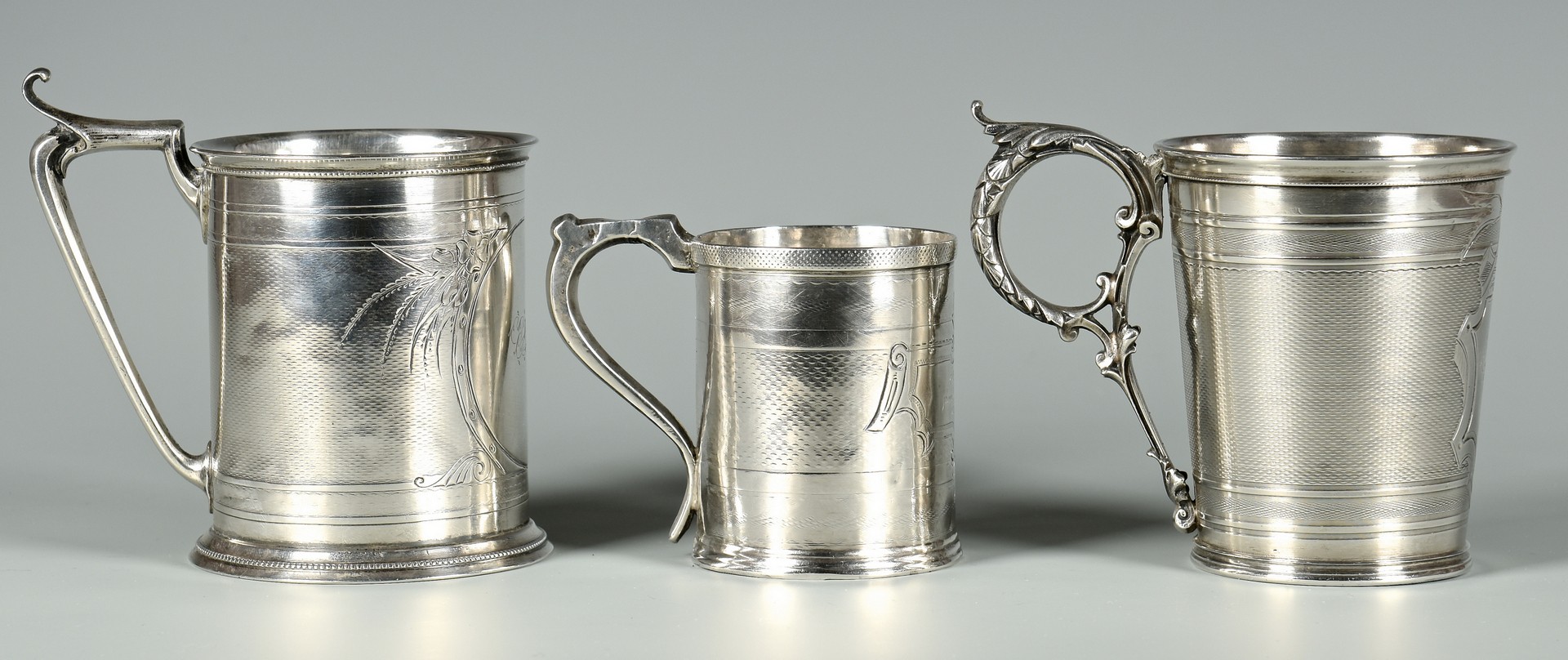 Lot 61: 3 Coin Silver Mugs