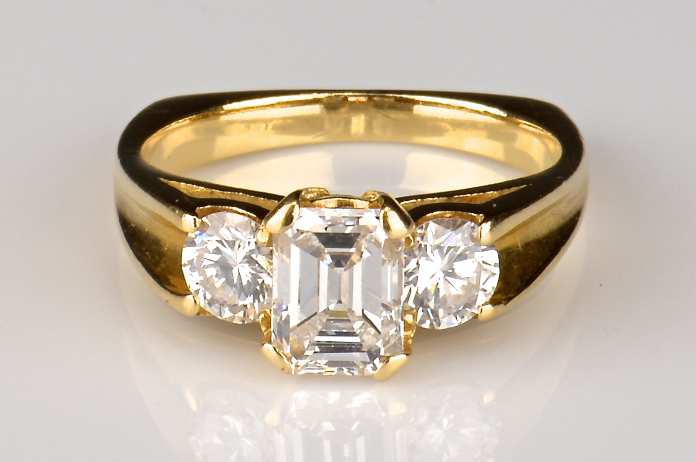 Lot 66: 18K 3-Stone Diamond Ring