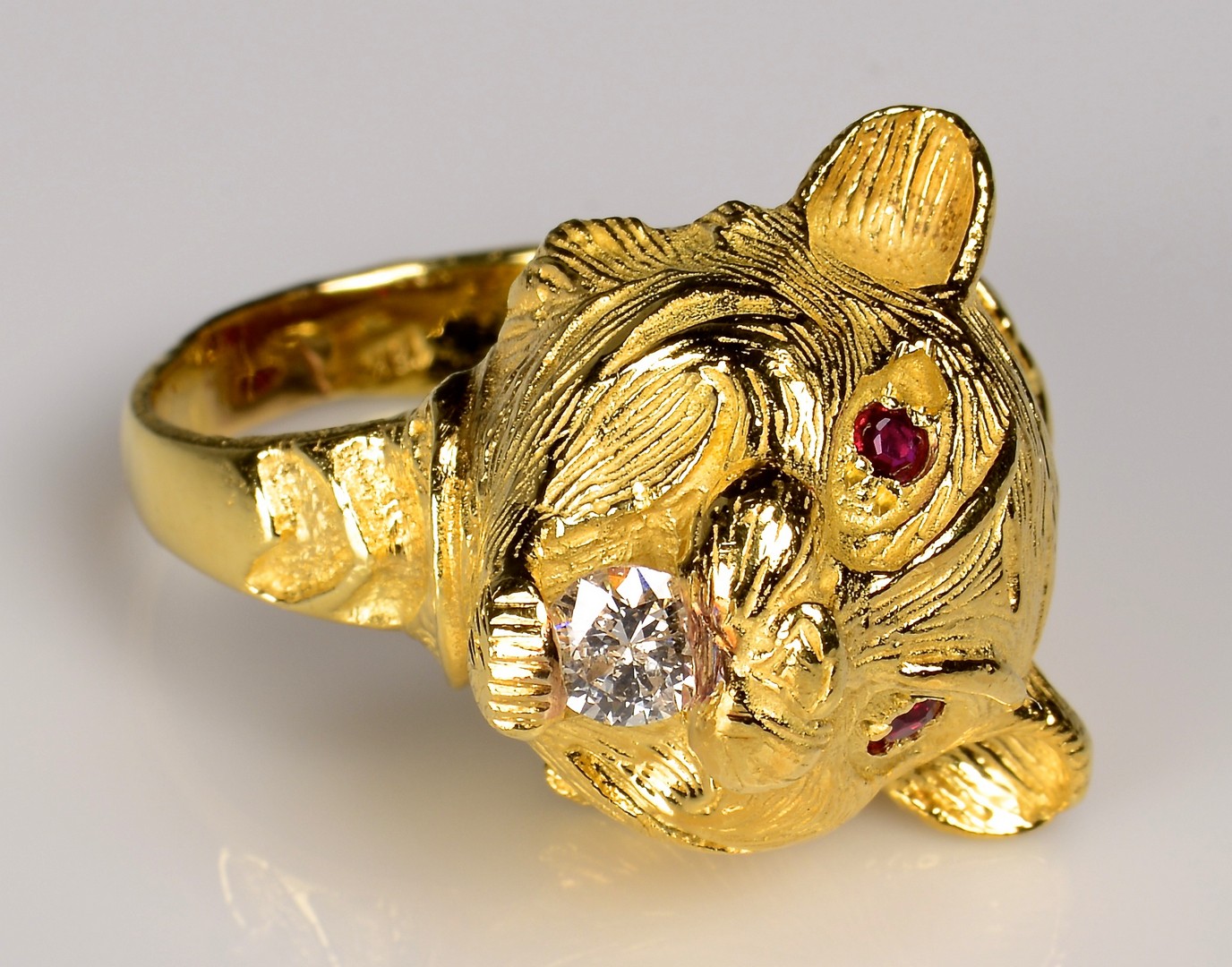 Lot 76: 18K Tiger Ring with .33 ct diamond
