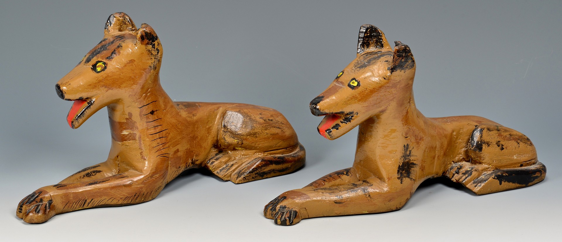 Lot 816: 4 Carved Folk Art Animals, Skunks & dogs