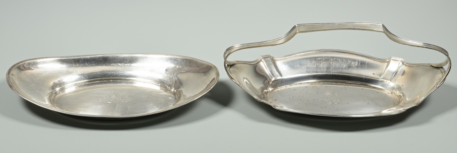 Lot 872: Sterling bread trays, sauce boat and flatware