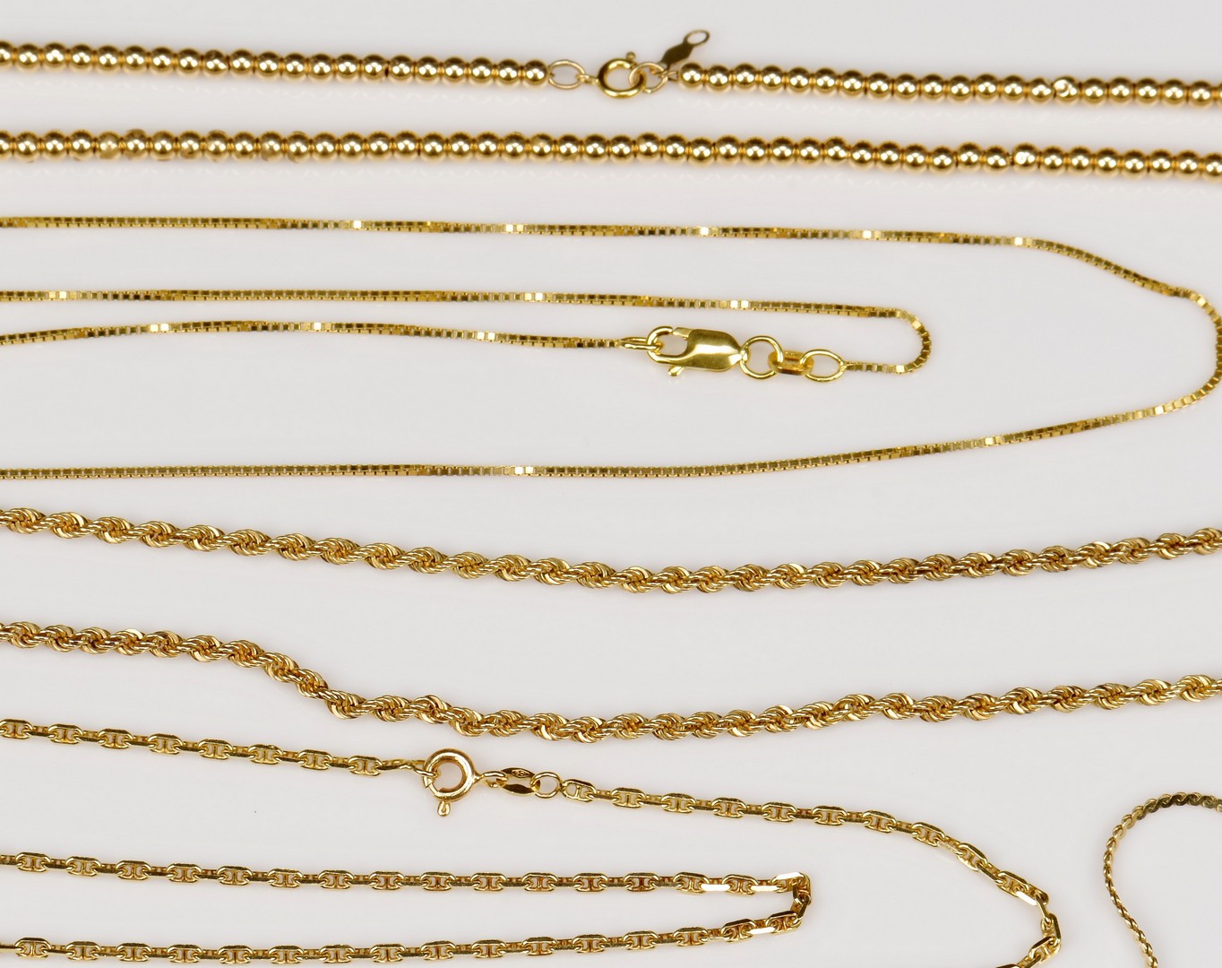Lot 941: Group of 5 14K Gold Chains