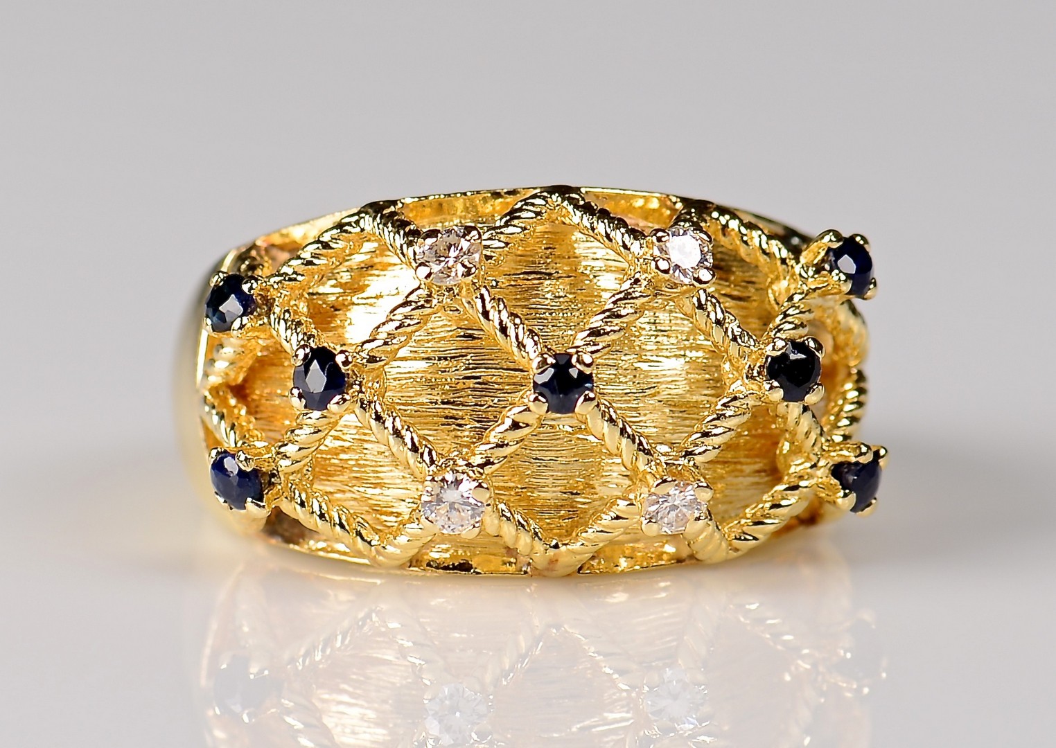 Lot 943: 14K Sapphire and Diamond Dome Ring