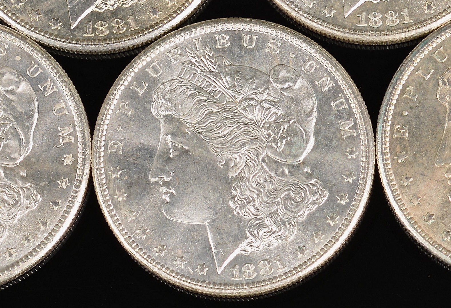 Lot 964: 16 Uncirculated 1881 Morgan Silver Dollars