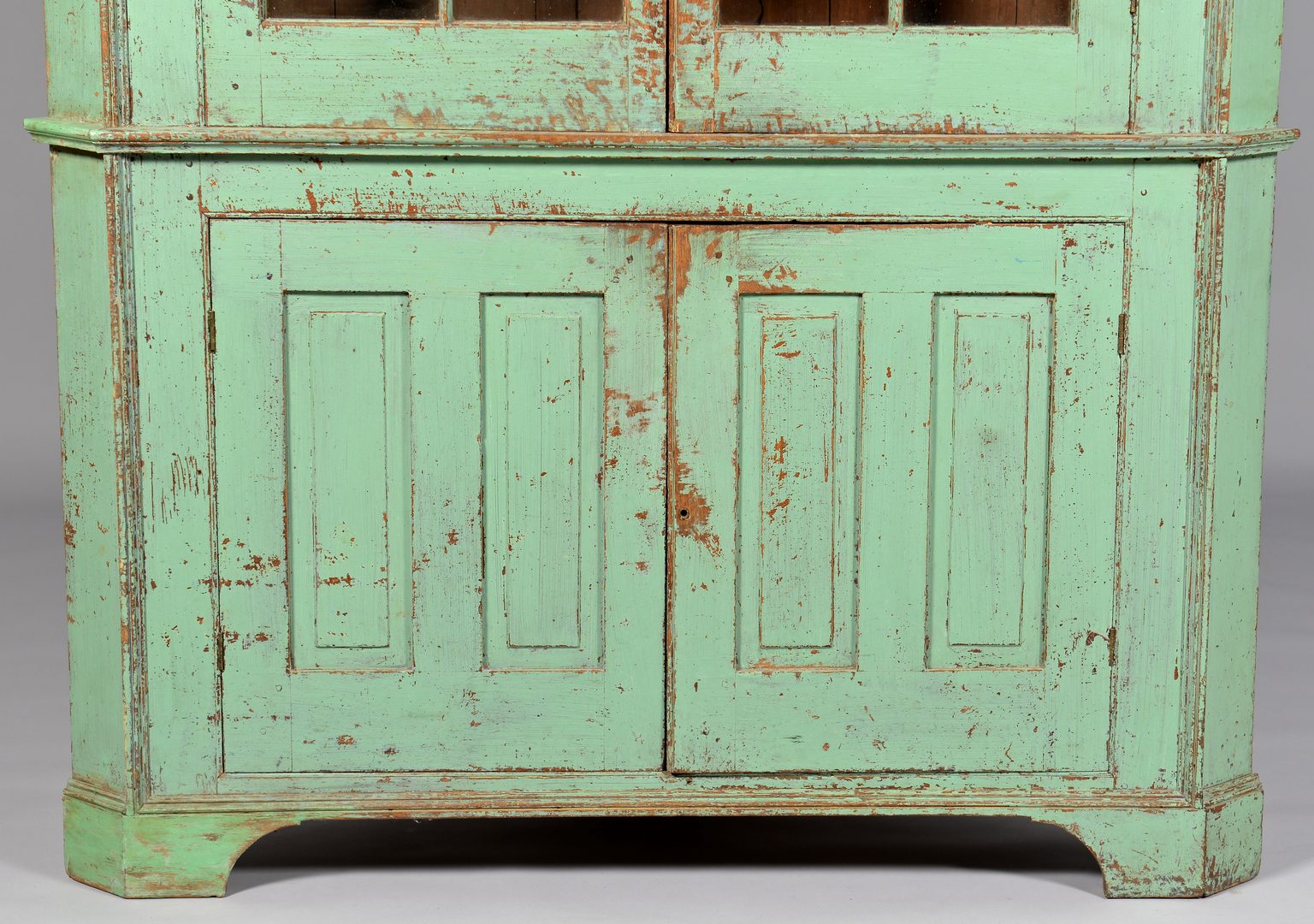 Lot 111: Early Ohio Green Painted Corner Cupboard