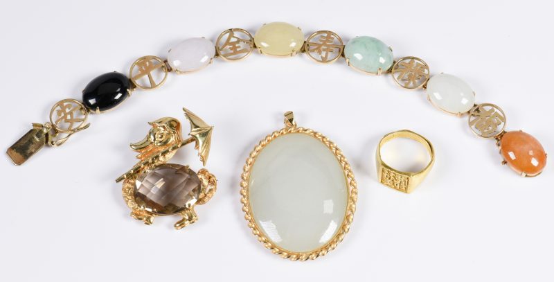 Lot 323: 4 Asian Style Gold Jewelry Items
