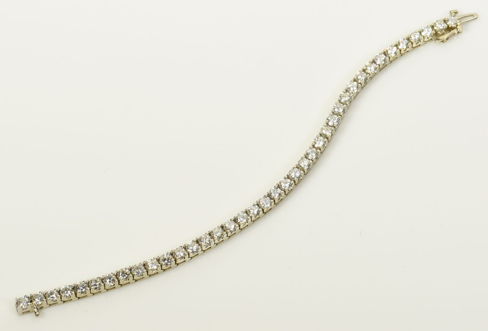 Lot 397: 14K Diamond Line Bracelet, 39 diamonds