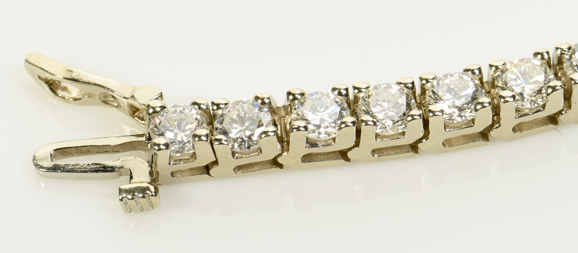 Lot 397: 14K Diamond Line Bracelet, 39 diamonds