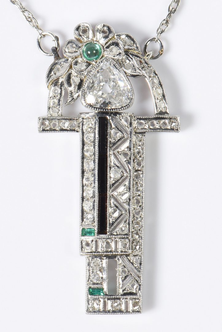 Lot 399: Platinum Art Deco Pear Diamond Pendant