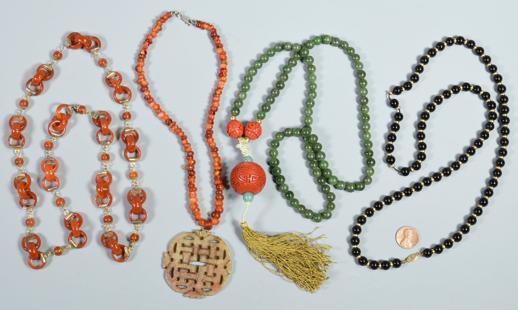 Lot 39: Chinese Carved and/or Beaded Necklaces