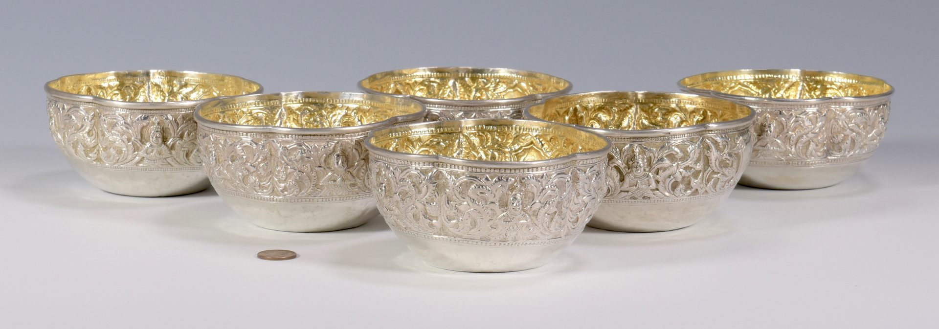 Lot 40: Six Asian Silver Bowls w/gilt interiors