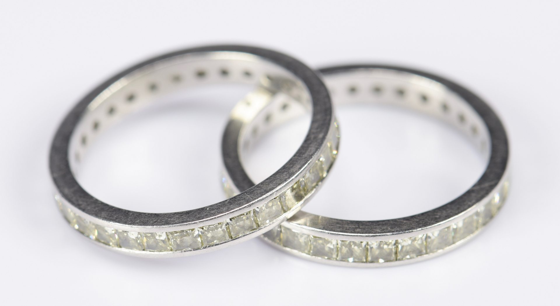 Lot 415: Pair Yellow Diamond Platinum Eternity Rings