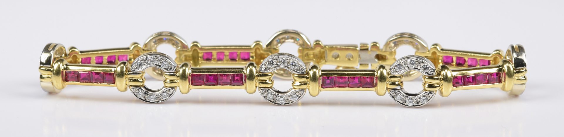 Lot 417: Ruby and Diamond 18K Link Bracelet